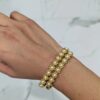 Brazalete Flores Dorado/Perla