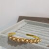 Brazalete Flores Dorado/Perla