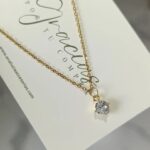 2025/12/1000050522.jpg Collar Destello