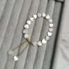 PULSERA CORAZÓN PERLA