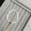 PULSERA CORAZÓN PERLA