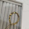 PULSERA CORAZONES DORADA