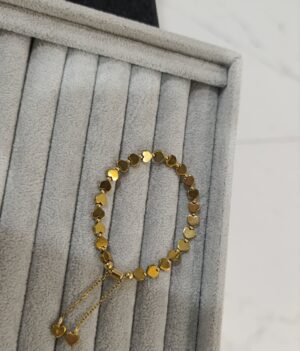 PULSERA CORAZONES DORADA